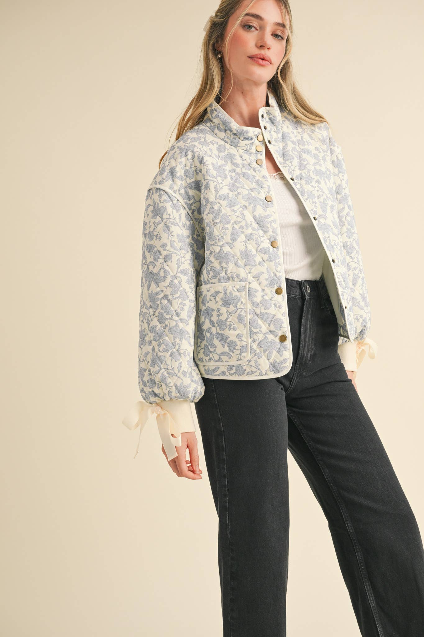 FLORAL QUILTED JACKET WITH RIBBON DETAIL