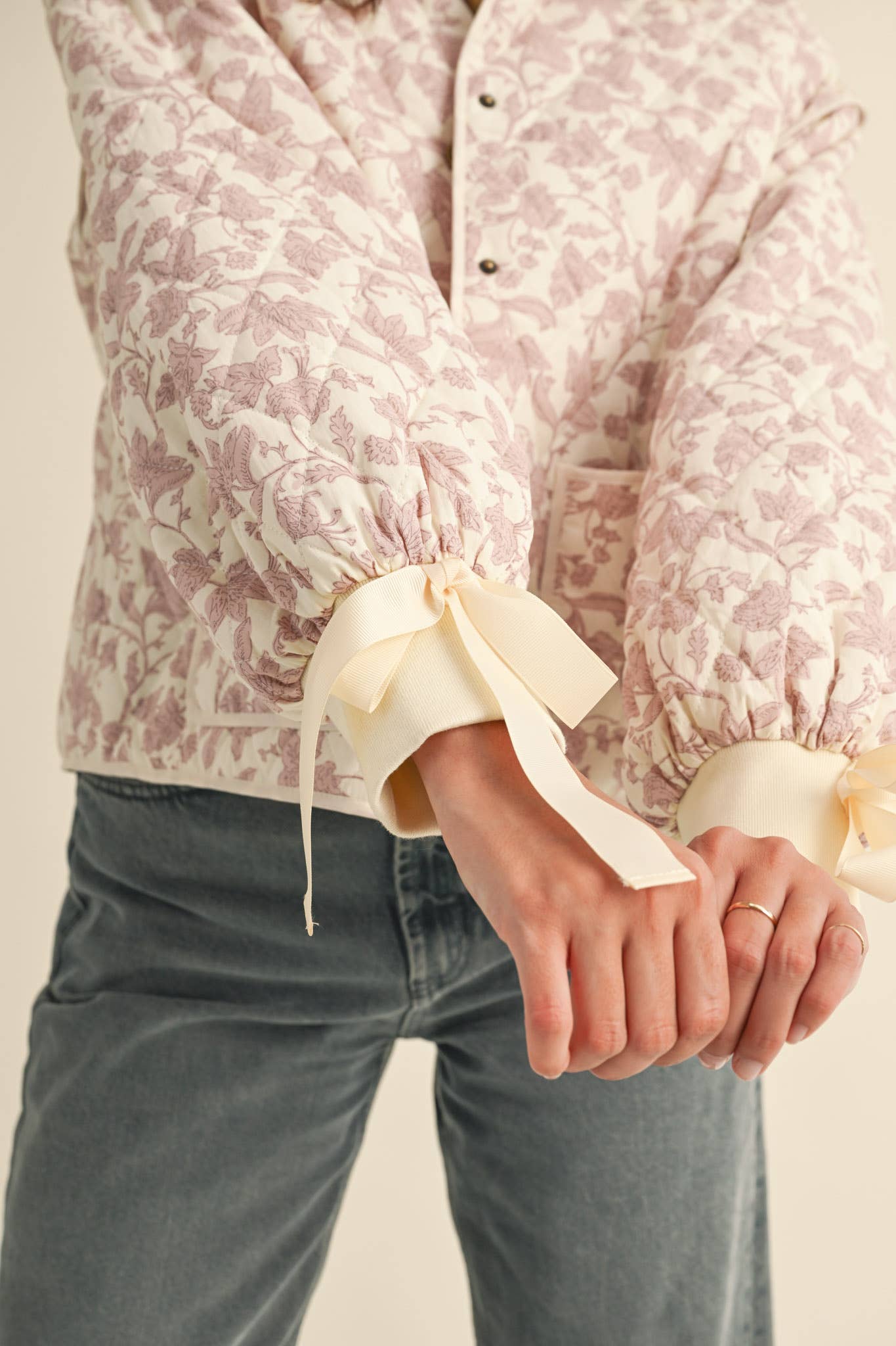 FLORAL QUILTED JACKET WITH RIBBON DETAIL