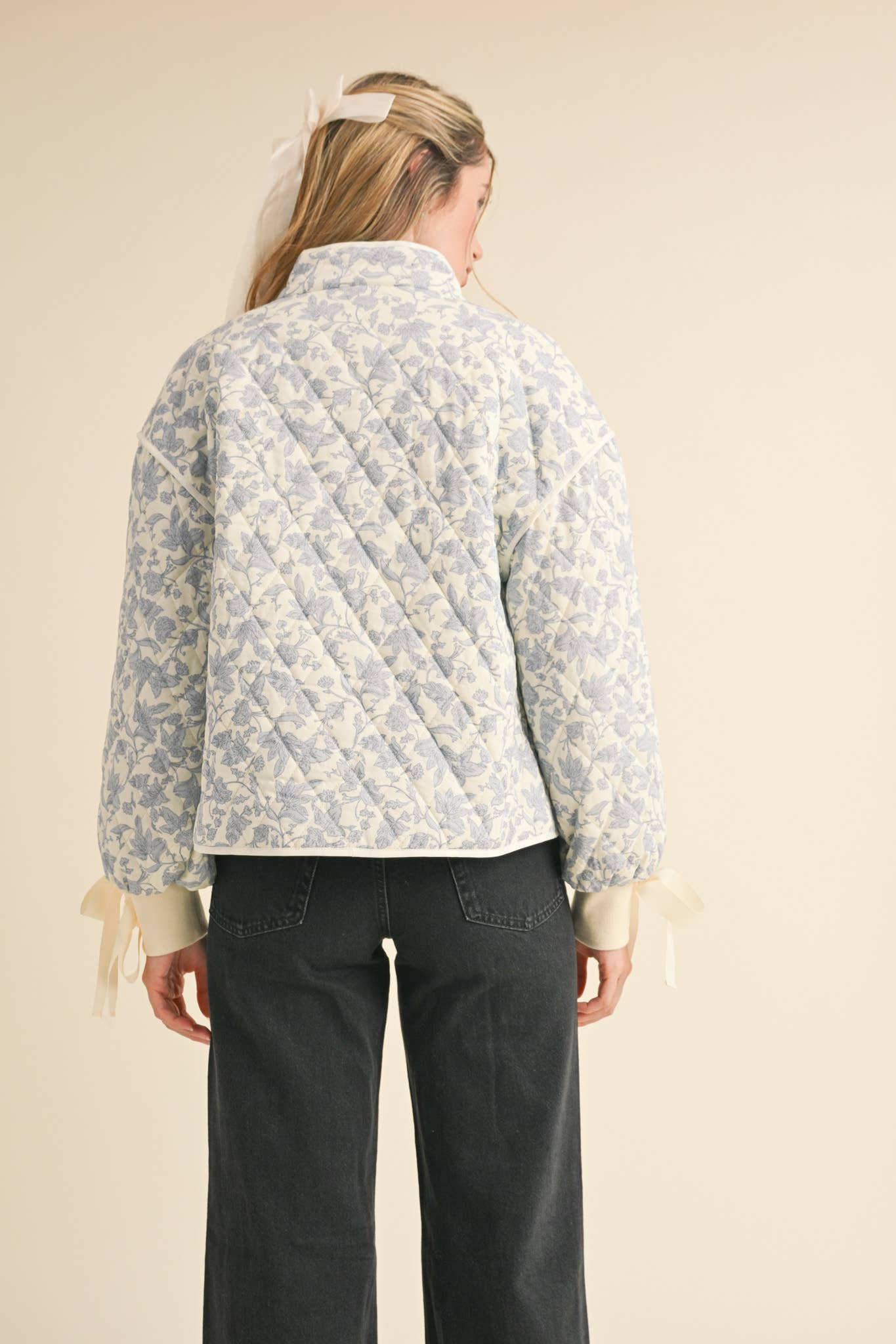 FLORAL QUILTED JACKET WITH RIBBON DETAIL